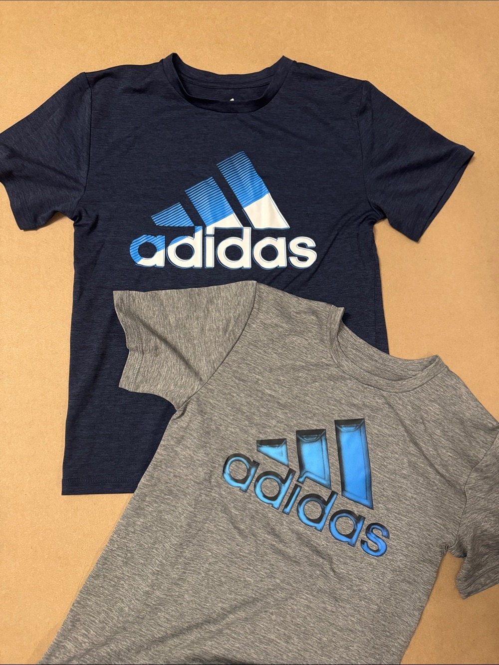 2 adidas Boys Short Sleeve Tees in Navy and Gray with Blue Logo